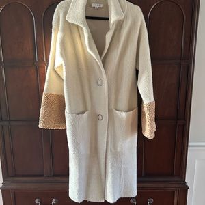 GOREGOUS THML coat with detailed sleeves.